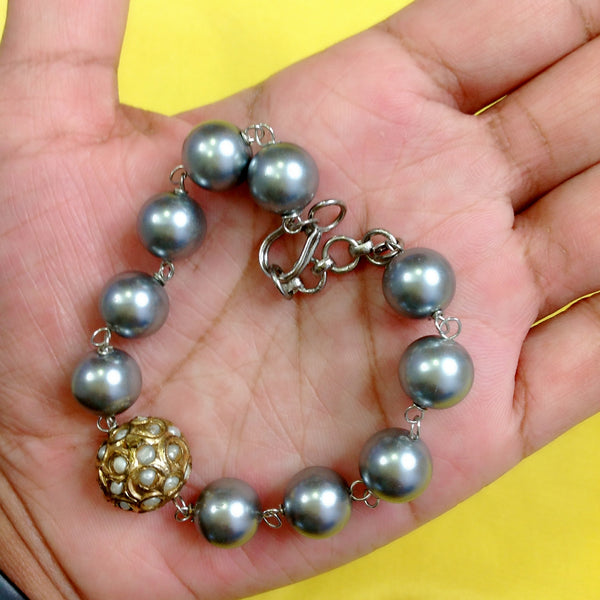 Attraction of Silver Pearls Bracelet