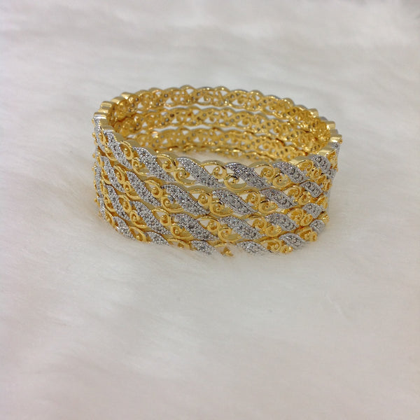 Waves of Gold and Crystal Bangles