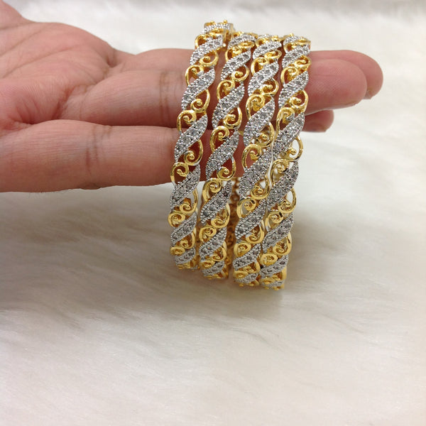 Waves of Gold and Crystal Bangles