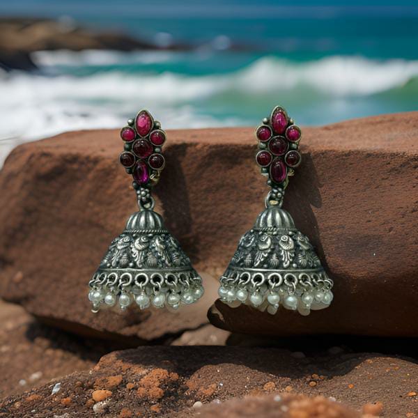 Pleasing Star Silver Jhumka Earrings