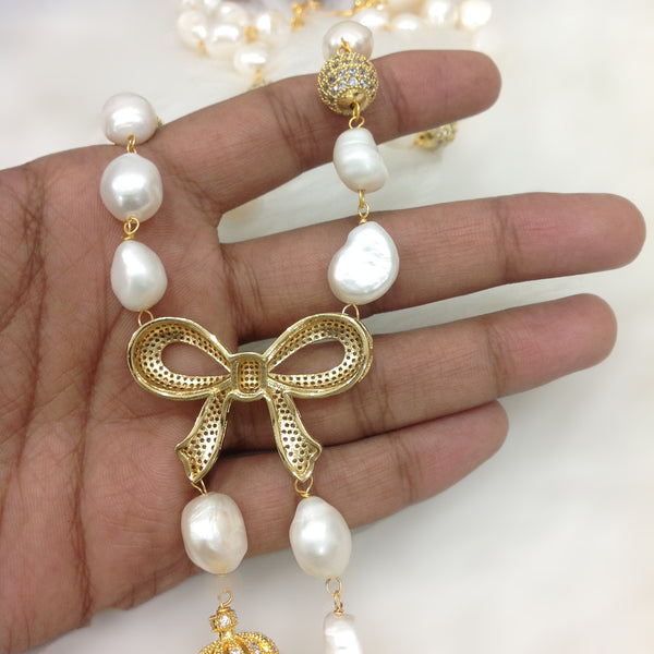 Bow Pendant with Baroque Pearl Necklace