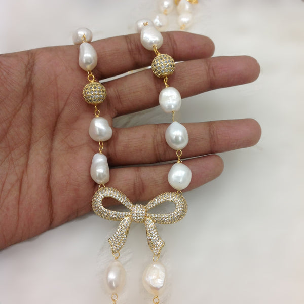 Bow Pendant with Baroque Pearl Necklace