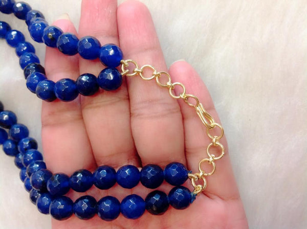Delightful Blue Gemstones with Golden Handcarved Oval Necklace