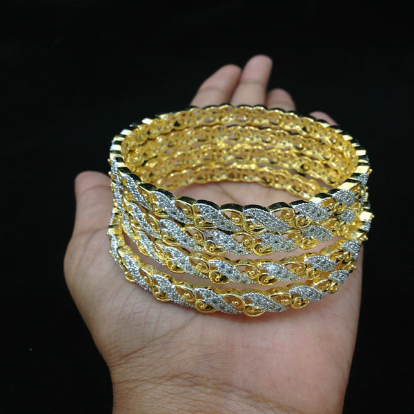 Waves of Gold and Crystal Bangles