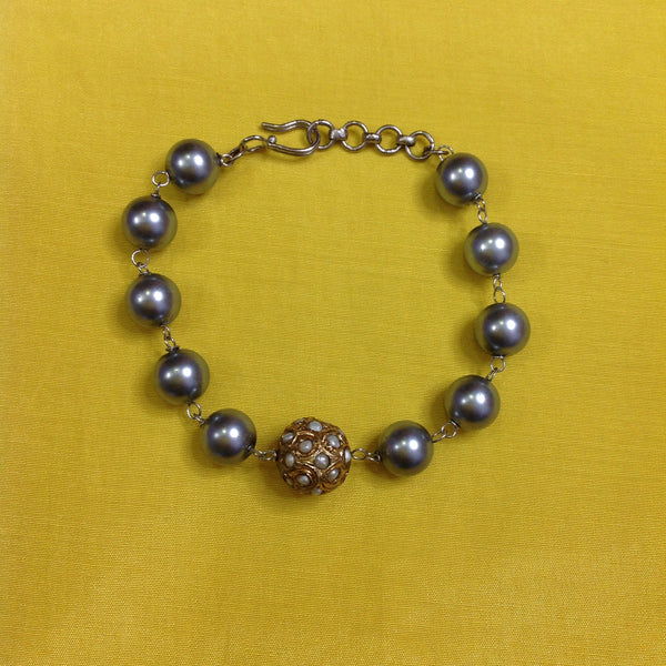 Attraction of Silver Pearls Bracelet