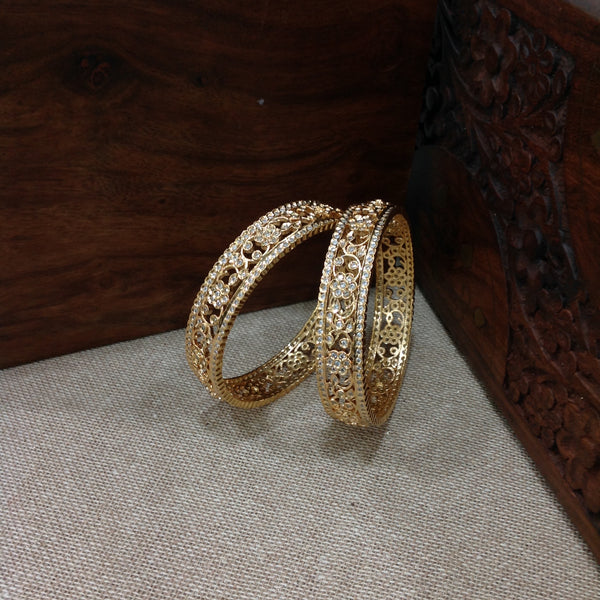 Golden and Cubic Zirconia Bangles