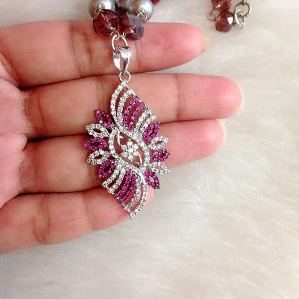 Luminent Shades of Magenta with Zircon Studded Pendant Necklace Set