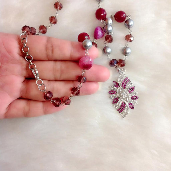 Luminent Shades of Magenta with Zircon Studded Pendant Necklace Set